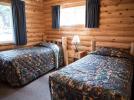 Main floor bedroom with two twin beds.