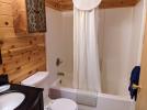 Master bathroom with a standard tub/shower.