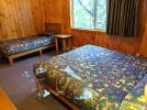 Upstairs bedroom with a queen and twin bed.