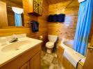 Upstairs bathroom with oversized whirlpool tub. 