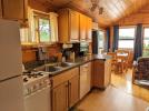 Kitchen with a standard refrigerator, gas stove, and dishwasher.