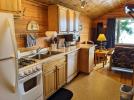 Kitchen with a refrigerator, gas stove, and dishwasher.