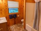 Upstairs bathroom with a standard tub/shower.