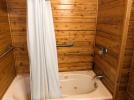 Bathroom with a whirlpool tub.