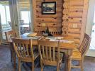 Dining area with seating for six and close to the 3 season porch.