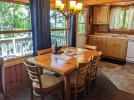 Dining area with a table for 6 and views of the lake.