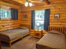 Main floor bedroom with two twin beds.