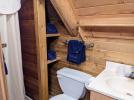 Loft bathroom with a shower stall.