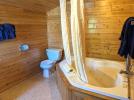 Loft bathroom with an oversized whirlpool tub.