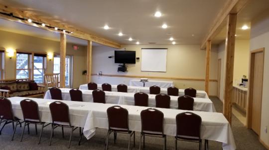A corporate-style presentation setup in the Grand Vermilion Chalet