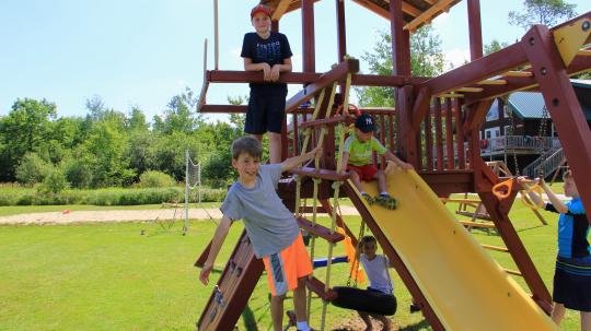 Children playing on a play structure