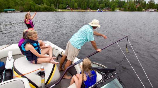 Group of girls learning how to waterski