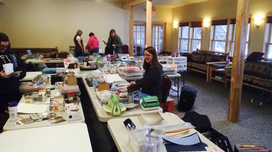 A Crafting group in the Grand Vermilion Chalet during winter