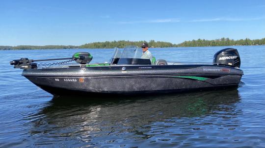 Ranger 200HP boating along Lake Vermilion shoreline.