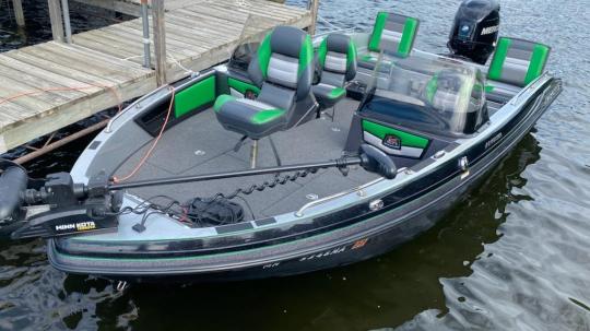 Ranger 200HP with 4 pedestal seats and two flip-up seats.