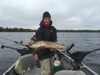 Fisherman holding a nice northern