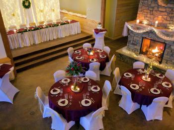 Tables near the fireplace in the Main Lodge