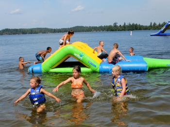 Children enjoy the beach at Pehrson Lodge