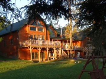 The Grand Vermilion Chalet as the sun drops low