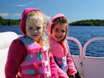 Girls enjoy a boat ride with Kids Program