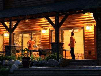 Friends enjoy ping pong at the Lodge