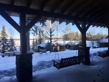 View from Lodge in winter- with snow and frozen lake