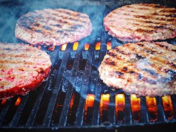 Burgers on the grill for dinner at Pehrson Lodge
