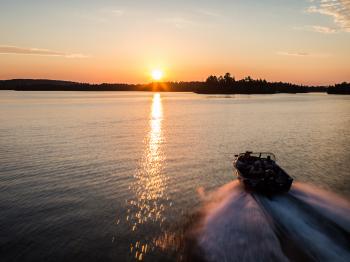 Boating on Lake Vermilion is a social distancing activity at Pehrson Lodge