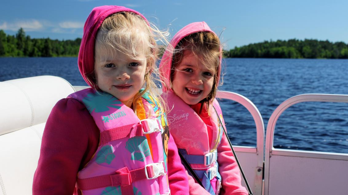 Girls enjoy a boat ride