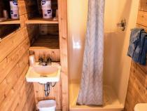Small bathroom with a shower stall.