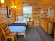 Loft bedroom with a twin bed.