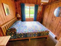 Bedroom with a queen bed.