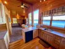 Kitchen with a refrigerator, stove, and dishwasher.