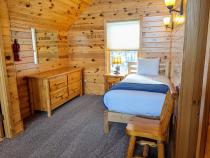 Loft area with a twin bed.