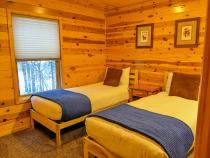 Main floor bedroom with two XL twins.