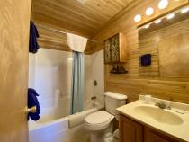 Master bathroom with a standard tub/shower.