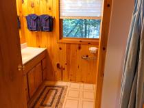 Main floor bathroom with an oversized shower stall.