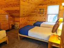 Upstairs bedroom with two XL twins and one regular twin.