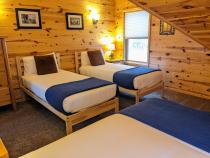 Upstairs bedroom with two XL twins and one regular twin.