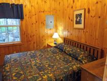 Bedroom with a queen bed.